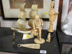 Two Victorian ivory to Oriental figures, a horn ship and a small fan etc