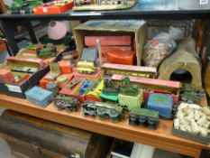 Good collection of Hornby series clockwork trains, carriages and rolling stock and related trackside