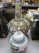 19th Century Famille Rose Canton bottle vase (cracked), 35 cms high and a modern Chinese ginger