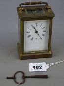 French brass cased carriage clock with key