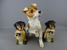 Large pottery seated terrier by Just Cats & Friends and a pair of German teapots modelled as begging