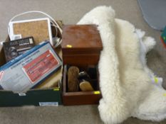 Boxed socket set etc, a wooden shoe shine box and brushes and two sheepskin type rugs
