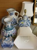 Non-matching blue and white washbowl and jug, two Oriental pottery table lamps with shades, a blue