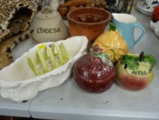 Three Sylvac and other sauce pots, a Carltonware toast rack, a possibly Sylvac candleholder and