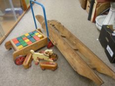 Vintage long sledge, a push-along toy of building blocks, a small vintage wooden train etc