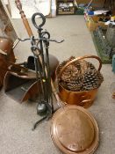 Helmet shaped coal scuttle, a set of wrought iron fire irons, a pair of vintage bellows etc