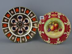 27 cms diameter Royal Crown Derby 1128 pattern plate and a 24 cms diameter Paragon cabinet plate
