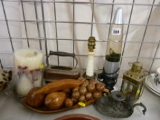 Modern lava lamp and one other, a selection of treen fruit, a pewter style chamberstick with owl