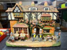 Interesting scratch built primitive style model of a country public house with figures, 31 cms high,