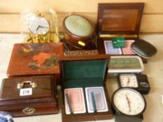 Brass anniversary clock with domed cover, a selection of playing card and other wooden lidded