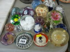 Nice collection of glass and other composite paperweights including Caithness, Olands and Millrace
