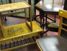 Small oak coffee table with monogram and 1974 carving to front, a small G-Plan occasional table,