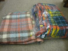 Three woven woollen car blankets
