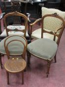 Two matching upholstered drawing room chairs, a single carver chair with floral tapestry seat, a