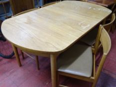Mid Century extending dining table with four chairs