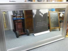 Very large bevelled edge silver finished framed mirror