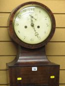 Art Deco style longcase clock with circular dial over a tapered trunk and base