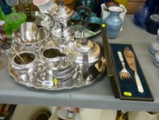 Four piece Mappin & Webb EPNS teaset on a wavy bordered tray, a vintage Ronson table lighter and