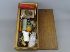 Vintage pine box with slide-on lid containing a mixed group of collectables including two