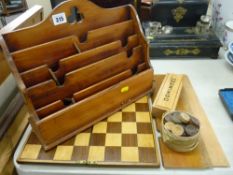 Antique folding wooden chess board, quantity of draughts, a desktop stationery rack and a boxed