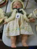 Dean's Ragbook Co composition doll with painted facial details, incised to the rear 'D R B Co