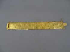 Italian yellow metal segmented bracelet, stamped 'CT18750'