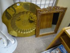 Brass charger approx 77 cms diameter and an ornate timber framed wall mirror