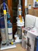 Two Dyson upright vacuum cleaners, Breville Professional juice extractor and an oil filled