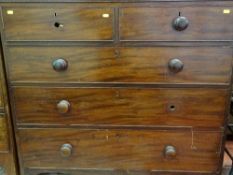 Mahogany chest of two over three drawers with turned knobs