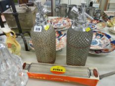 Two good vintage soda syphons and a boxed Pyrex rolling pin