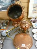 Barrel shaped copper and wrought iron coal scuttle, an interesting copper spirit kettle on stand,