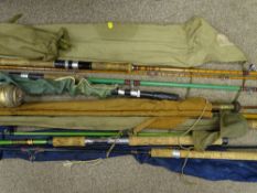 Quantity of fly fishing rods in canvas cases including split cane