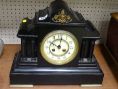 Excellent slate mantel clock with pillar supports and steeple top