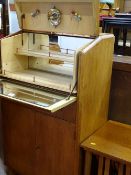 Mid Century Nathan well presented cocktail cabinet and a light wood nest of five tables