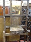 Heavily carved hallstand with central bevelled edge mirror with drawer, base shelf (no drip trays)