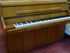 Light wood Bentley upright piano