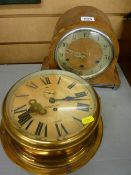 Sestrel brass ship's clock with key and a wooden dome mantel clock with presentation plaque