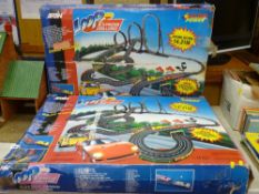 Two boxed Artin Loop Express Challenge electric power racing game sets