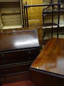 Polished wood three drawer writing bureau, a four shelf large whatnot and a drop end dark wood
