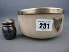 Silver rimmed turned treen bowl and a white metal salt cellar