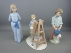 Nao figurine of a young girl, Nao young boy and puppy and a Leonardo Collection figure of a young