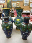 Pair of cloisonne vases and another similar pair