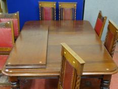 Mahogany extending dining table with two extra leaves and a set of four twist back chairs and
