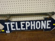 Vintage enamelled metallic sign for 'Telephone' in the form of an arrow