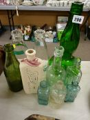 Pair of vintage local interest milk bottles and other vintage bottles including Boots the Chemist