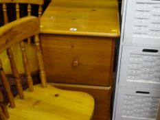 Two drawer pine filing cabinet, pair of pine spindleback kitchen chairs and a white finished three