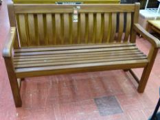 Heavy hard wood three seater garden bench