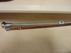 Silver topped swagger stick and a silver topped walking cane