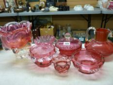 Seven pieces of cranberry glassware