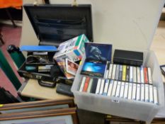 Vintage briefcase, selection of cassettes and CDs and a boxed Fuji 10.2 megapixels camera and